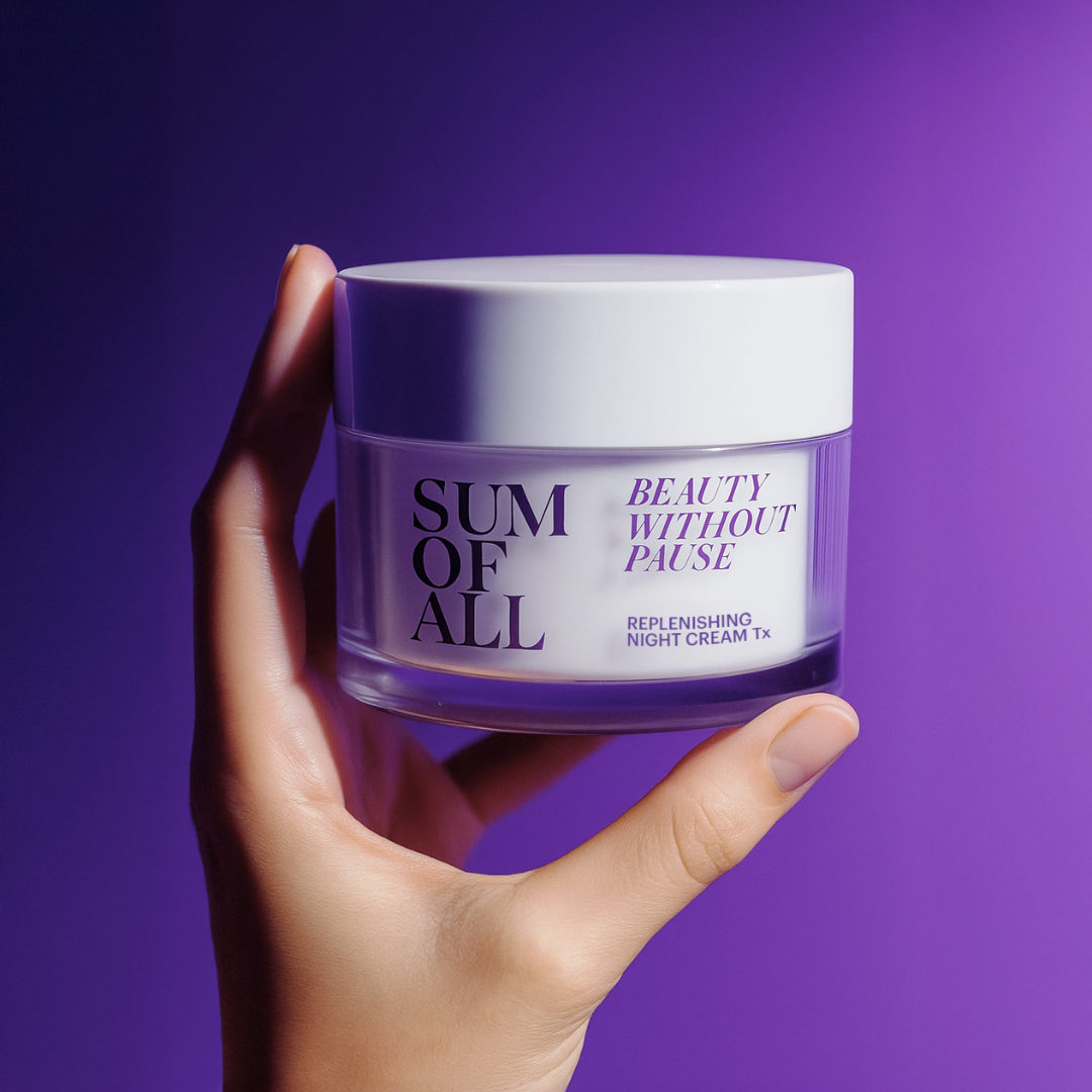 Hand holding a jar of 'Sum of All' replenishing night cream against a purple background